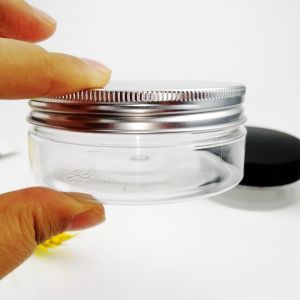 China 23mm Shoulder 100ml Plastic Screw Cap Jars Oblate Shape on sale