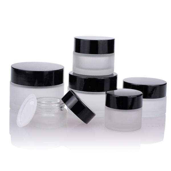 Buy Round 10g 20g 30g Cream Glass Jars Frosted With Black Plastic Cap at wholesale prices