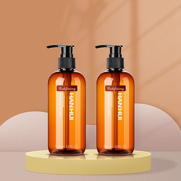 Amber Boston Round Shape Empty Lotion Bottle With Neck Size 24/410 Pump