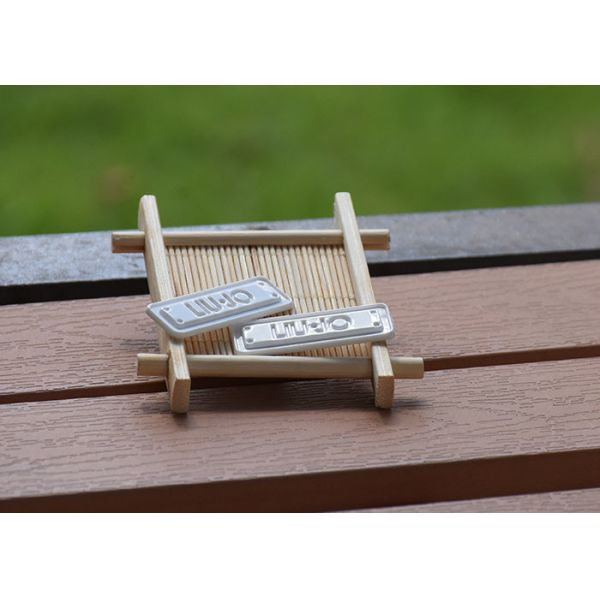 Degradable 2mm garment TPU Clothing Labels With Mould Embossed Logo