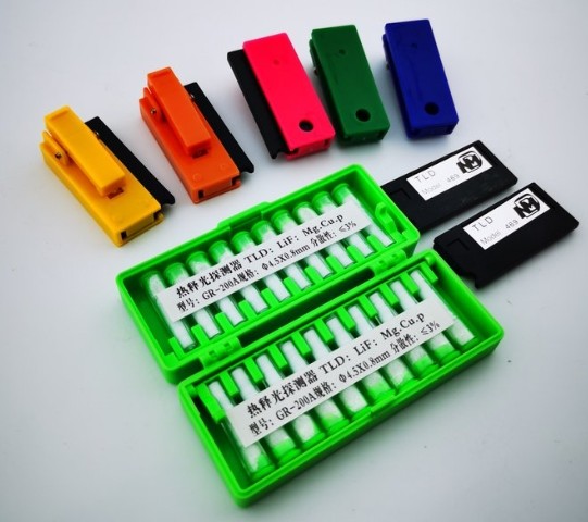 Lightweight and Durable Thermoluminescent Dosimeters TLD with Piezoelectric