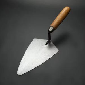 China Wooden Handle Margin Trowel Carbon Steel Point Masonry Trowel on sale