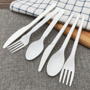 China Wholesale Set Of Biodegradable CPLA Disposable Cutlery Composed Of Knife Fork Spoon For Parties Paper Wrapped Tableware on sale