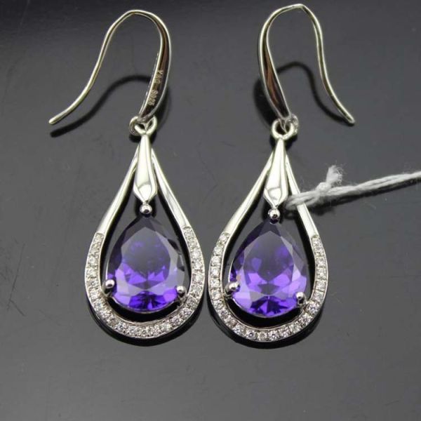 Buy White Gold Plated 925 Silver 7x9mm Oval Amethyst Cubic Zirconia Earrings (PSJ04585) at wholesale prices