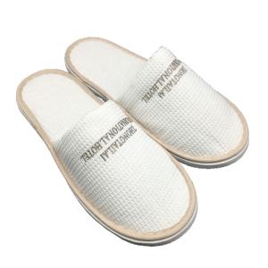 China Travel Disposable Slippers Hotel Slippers Logo Customized Home Supplies on sale