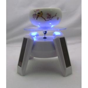 Rotary solar china display holder